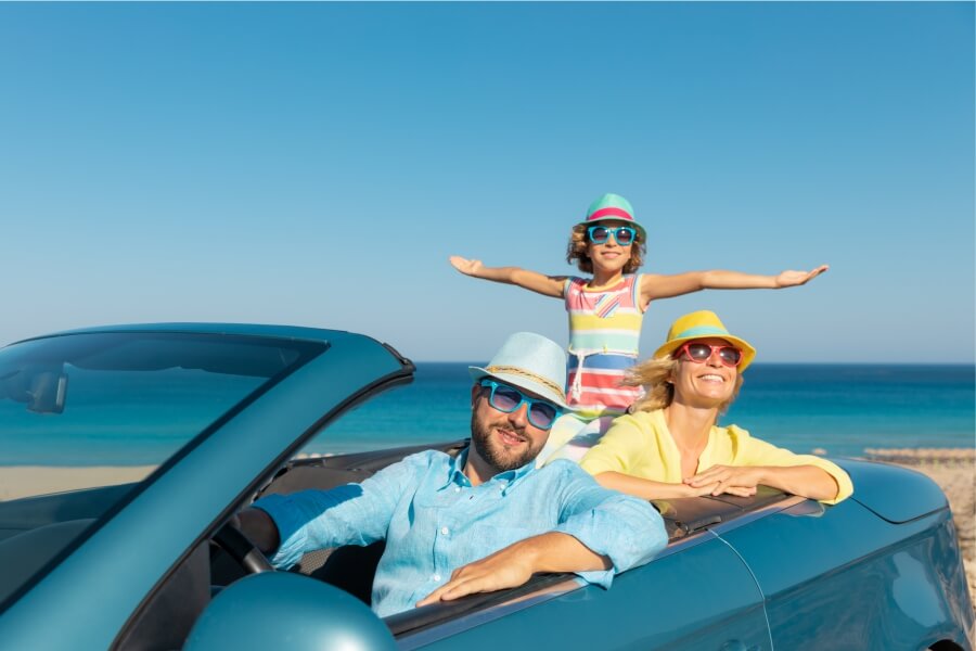 happy family travel by rental car